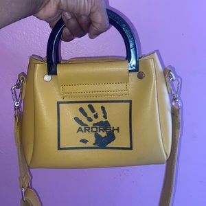 Cute yellow bag that can be dressed down or up!